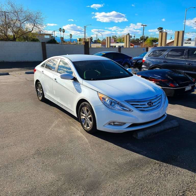 Fairway Auto Cash Car Rental - white sedan
